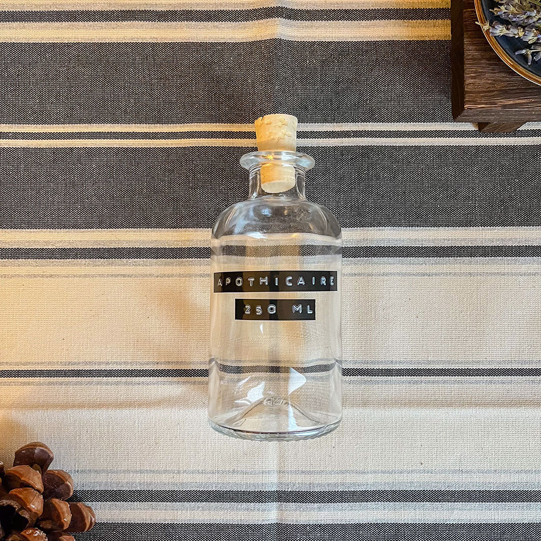 Bouteille apothicaire ronde 250ml en verre transparent avec bouchon en liège naturel