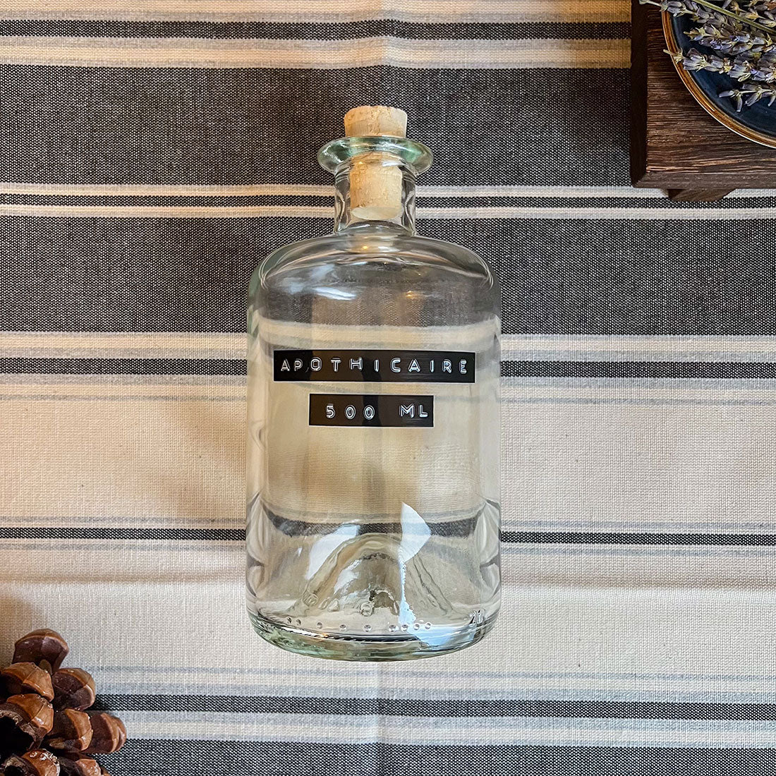 Bouteille apothicaire ronde 500ml en verre transparent avec bouchon en liège naturel