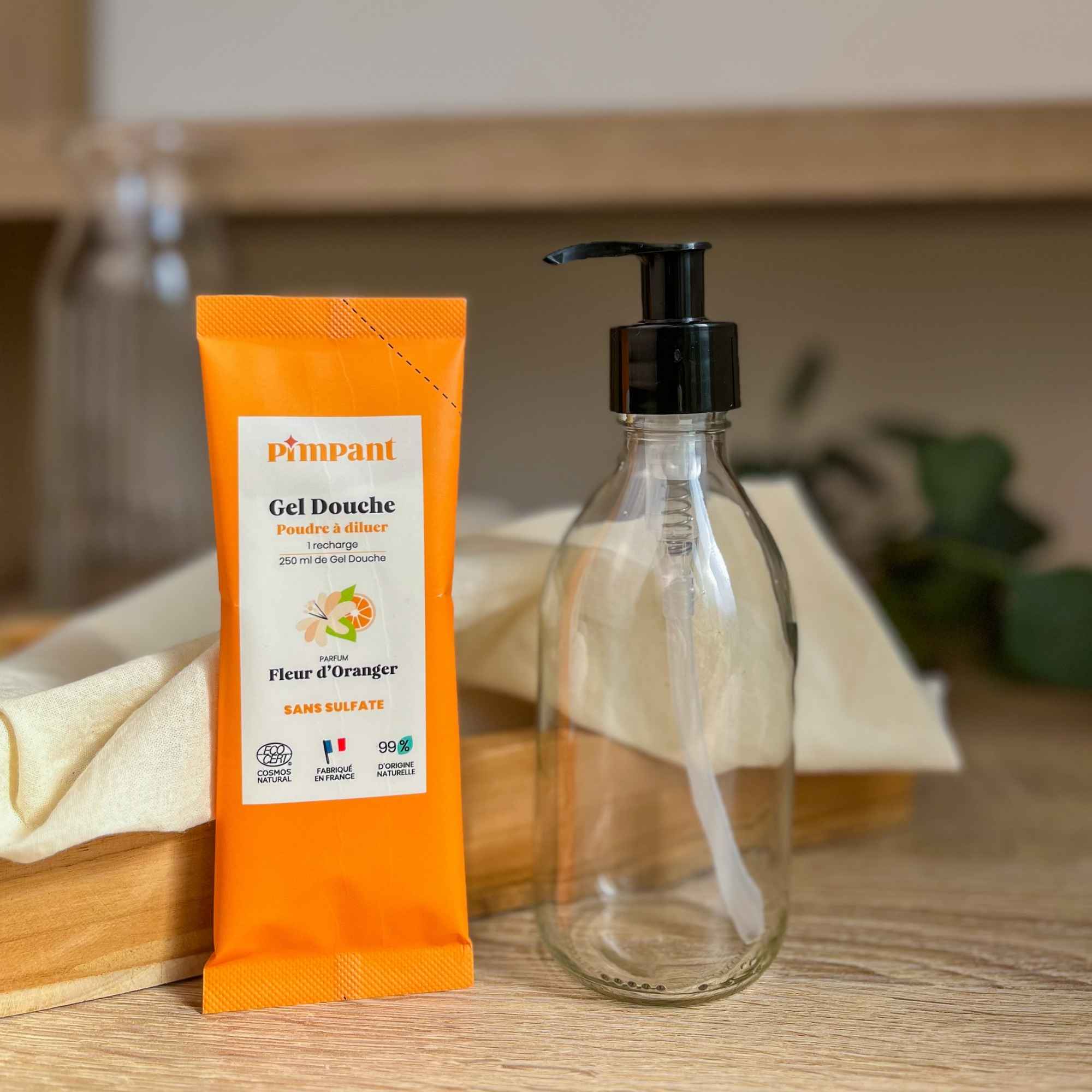 Produit Pimpant pour la douche, à base de fleur d’oranger.