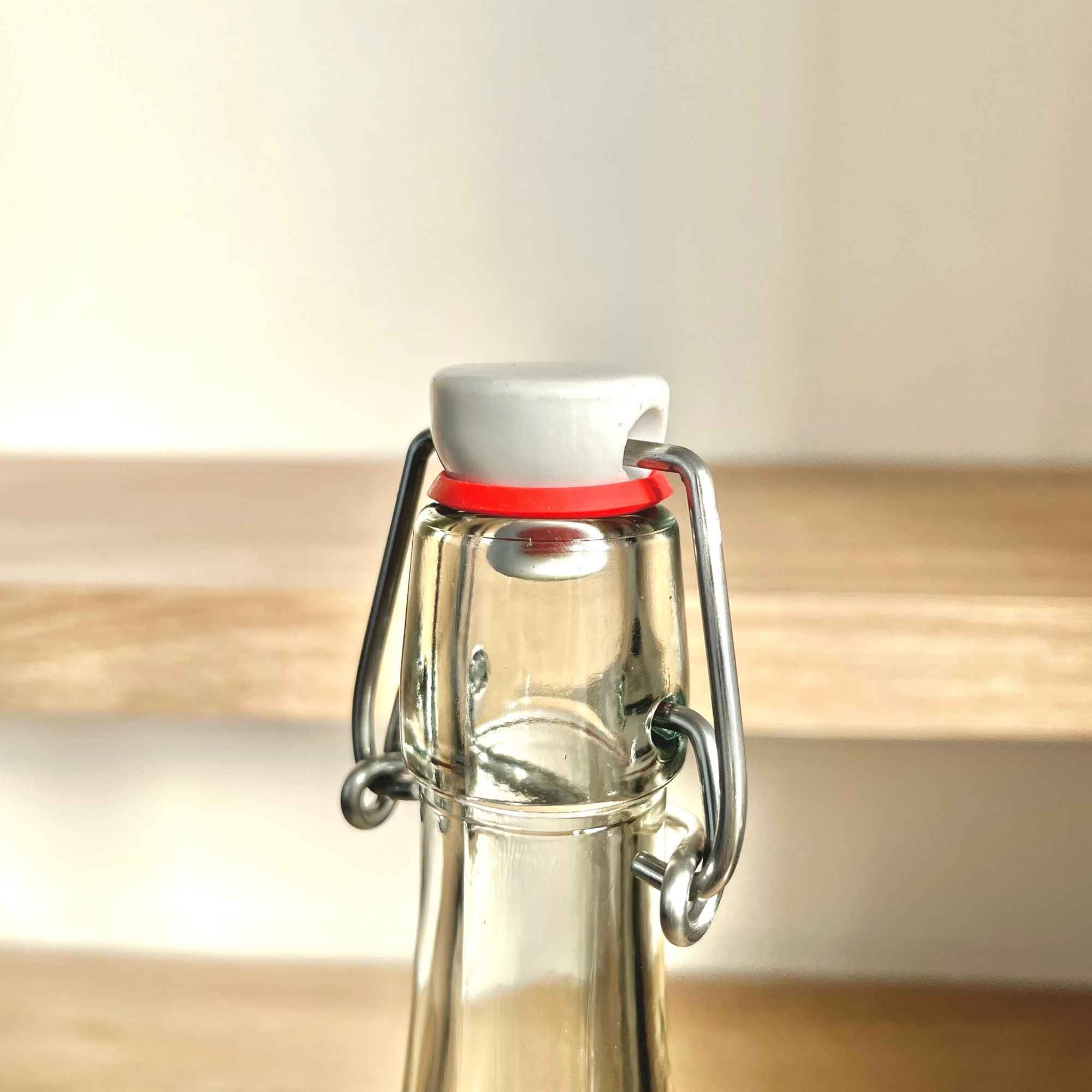 Flacon en verre réutilisable 75 cl, parfait pour le champagne des fées ou le kéfir de fruits.