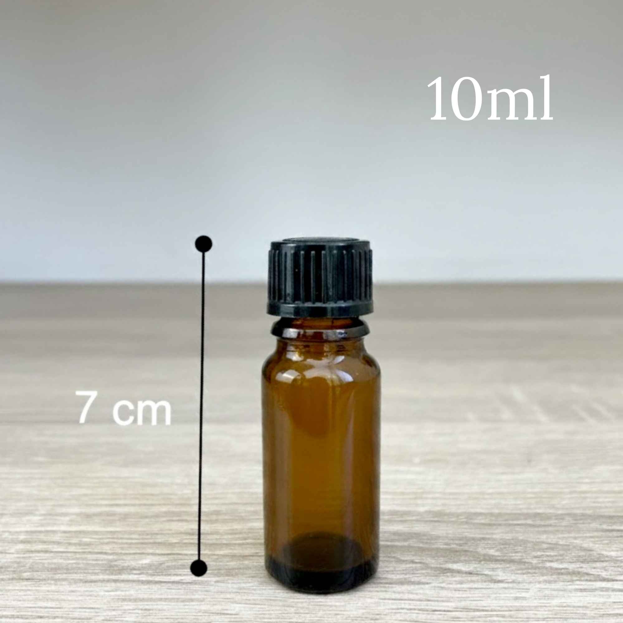 Flacon en verre ambré avec codigoutte intégré, format 10 ml, adapté aux huiles essentielles.