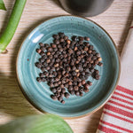 Graine de poivre noir fumé bio, zoom, une épice unique.