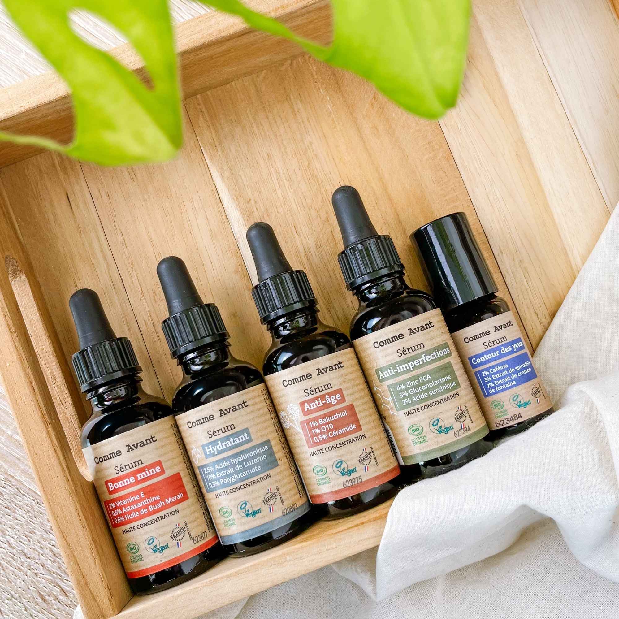 Ensemble des sérums naturels Comme Avant — bonne mine, hydratant, anti-âge, anti-imperfections et contour des yeux — présentés en gamme complète.